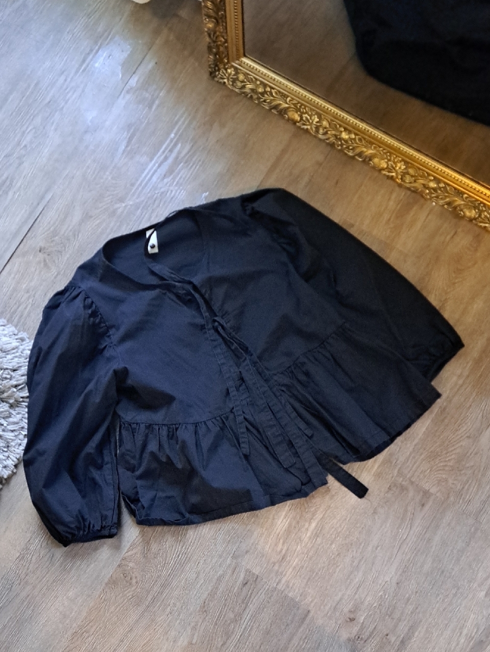 Black Top with Size M Button Detail